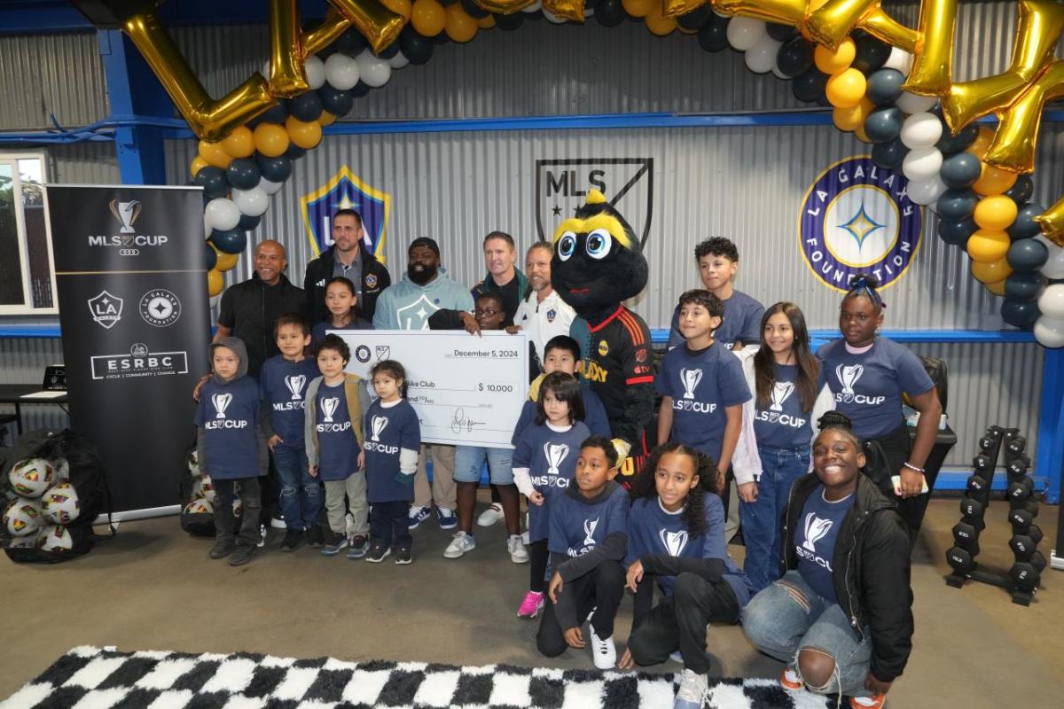 Jan Mirman, Senior Vice President, MLS Community Engagement, Tom Braun, President & COO, LA Galaxy, LA Galaxy alumni and MLS Greats Cobi Jones and Robbie Keane presented the East Side Riders Bike Club with a check donation.