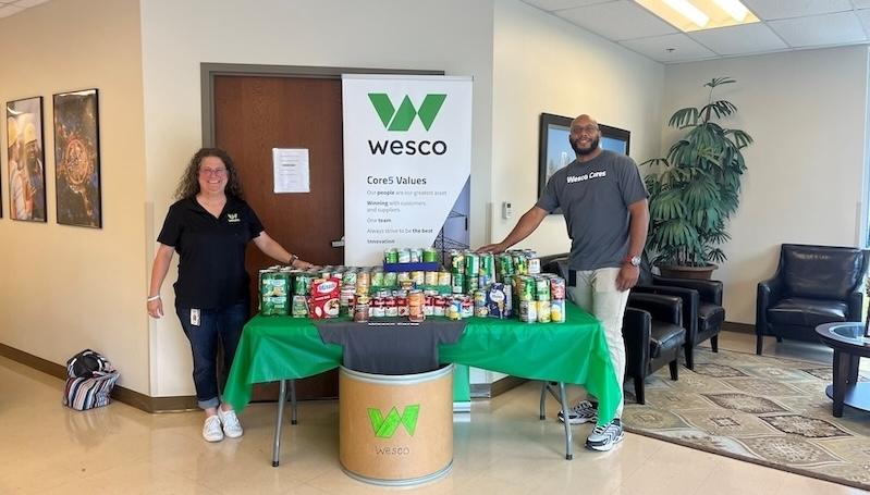 Wesco canned food donations and core values presentation.