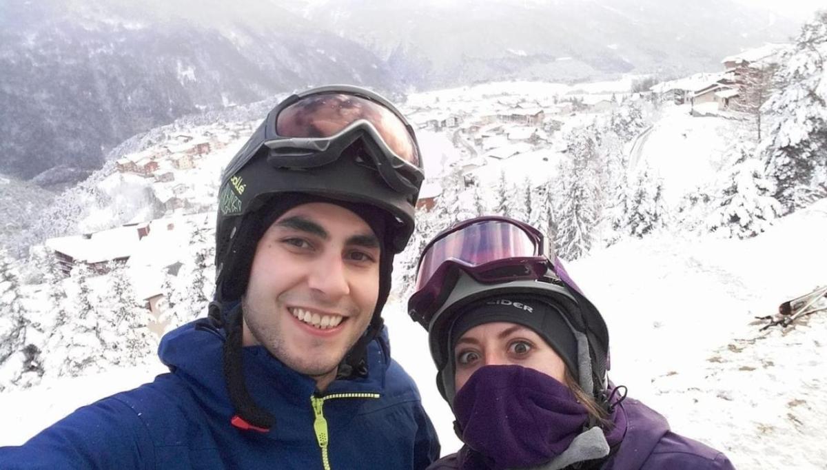 Evila Melgoza and husband skiing in mountains