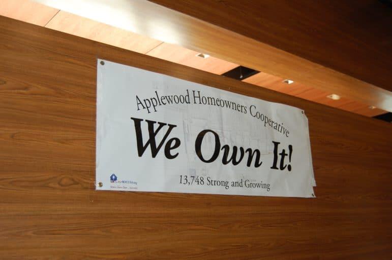 Applewood Homeowners cooperative banner: "We Own It".