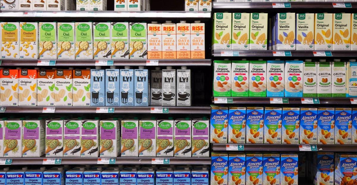 Shelves of different cartons of food and drink items.