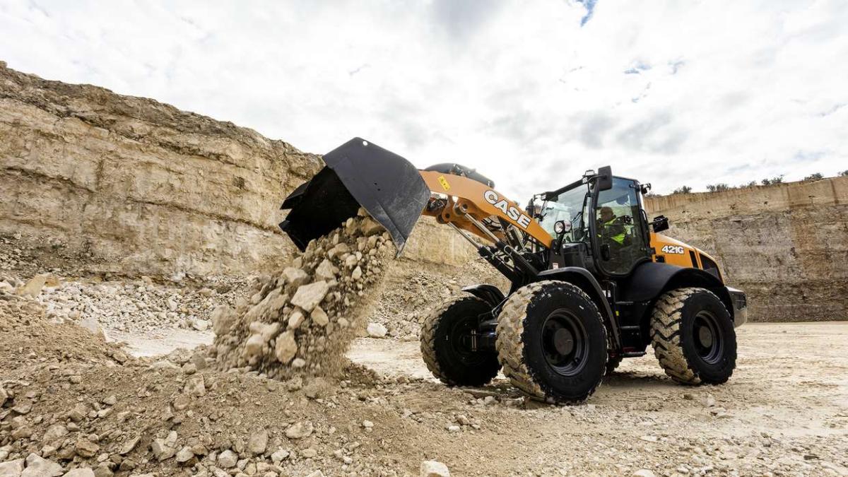 CASE Loader unloading rocks