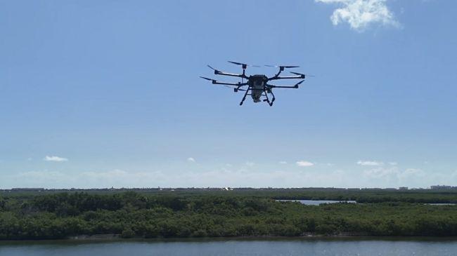 A drone flying over water