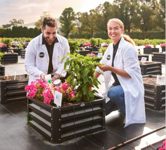 2 People potting plants