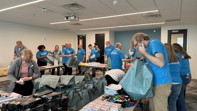 People packing severe weather kits for donation