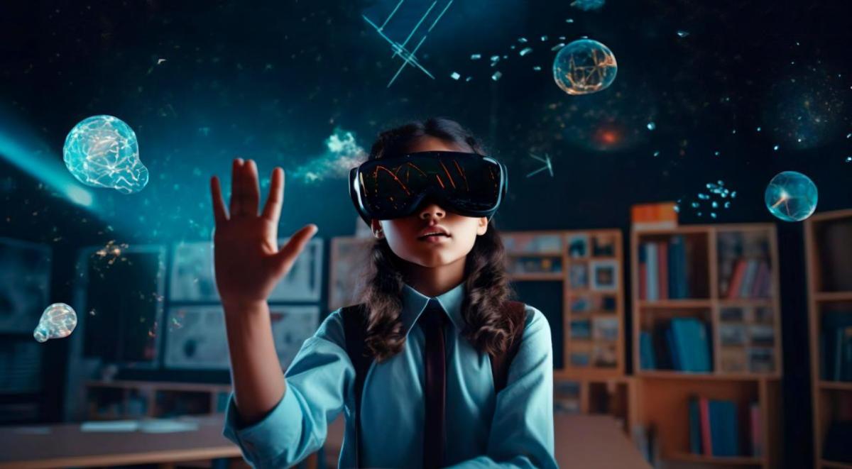 A child wearing a vr headset with a hand up in a dark classroom setting. Virtual shapes appearing.