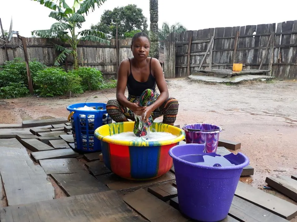 Someone handwashing clothes