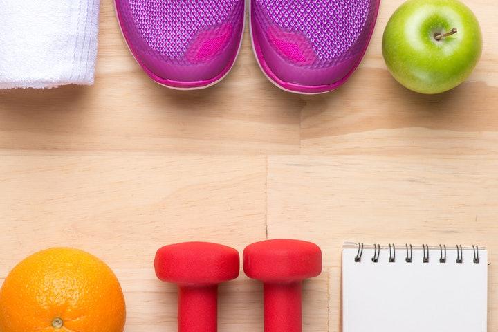 Health and fitness items lined up on a floor