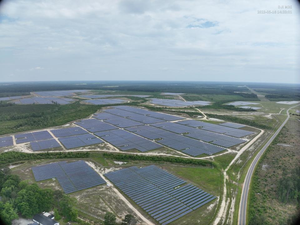 Aerial view of large fields of solar panels