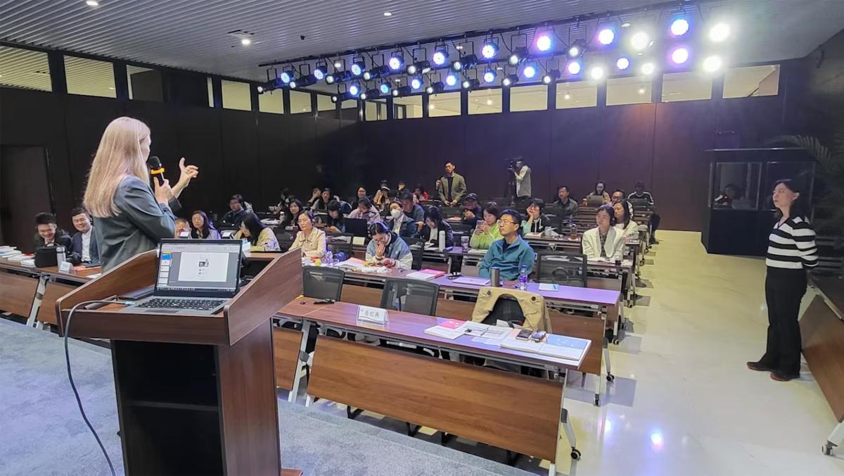 speaker speaking to a group