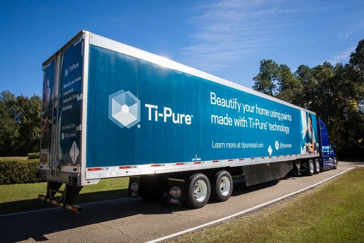 A semi truck outside "Ti-Pure" logo on the side.