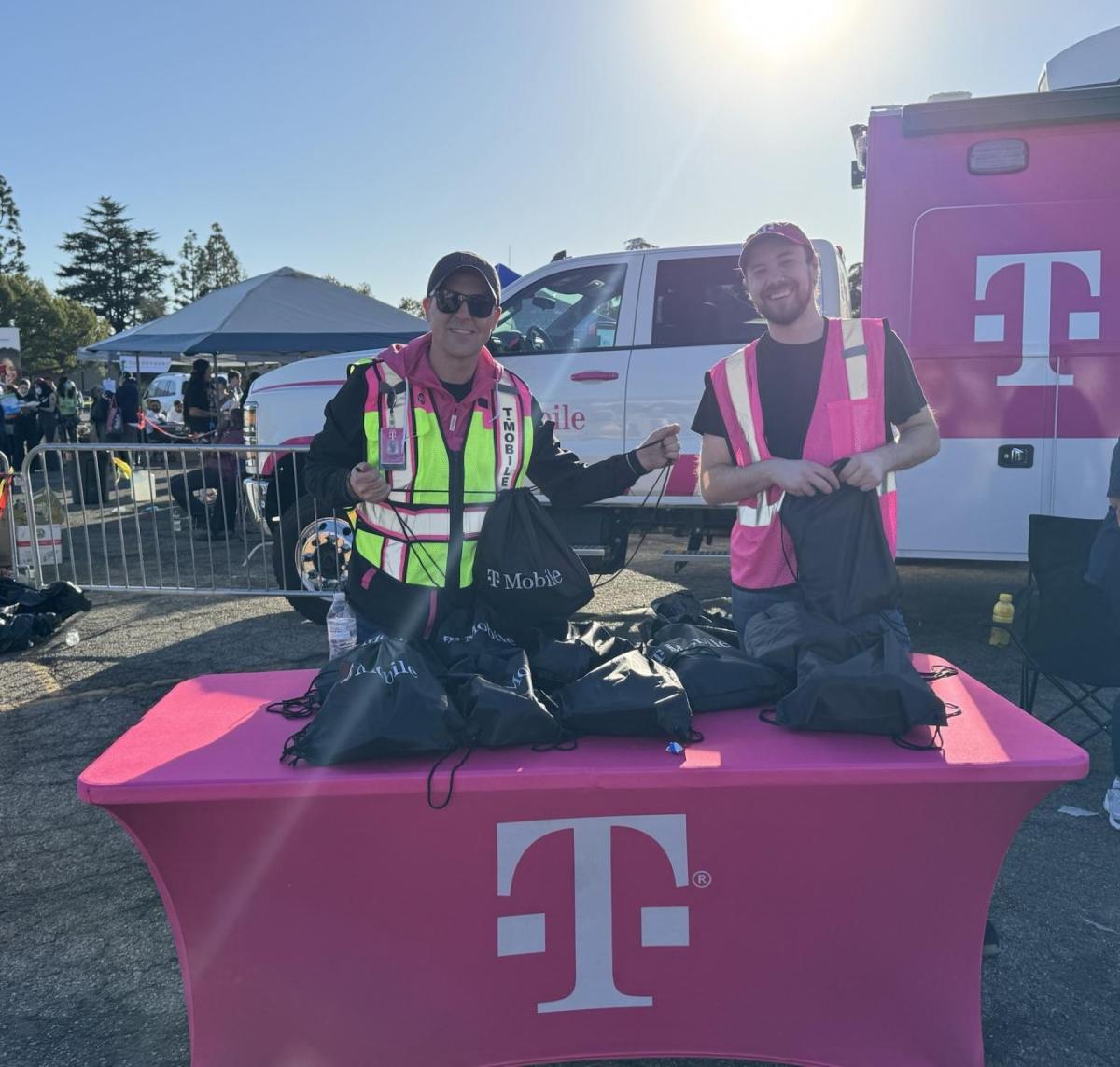 volunteers at a booth