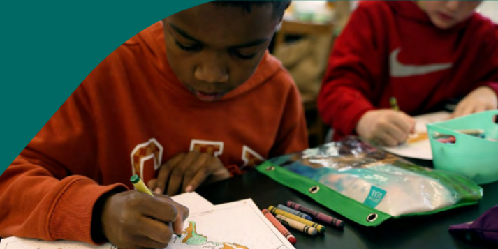 Children coloring pages next to each other.