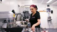 A person grabbing ingredients in a bakery setting.