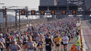 Large group of people running a marathon