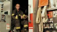 Nigel Graham sitting in a firetruck