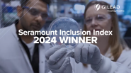 Two people looking at a petri dish that one is holding up. "Seramount Inclusion Index 2024 Winner".