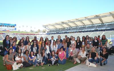 Attendees gather on the field of StubHub Center during the 2016 Women’s Leadership Series presented by Herbalife Nutrition.
