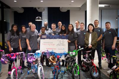 Associates in T. Rowe Price's New York City office built 25 bicycles for children of active-duty servicemembers