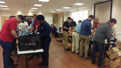 One to 500 in no time! Club Car employees in Augusta, GA created an assembly line to pack more than 500 snack packs including nutritious snacks, stickers and inspirational notes that will be shared with Columbia County children and distributed through local schools during the holiday season.