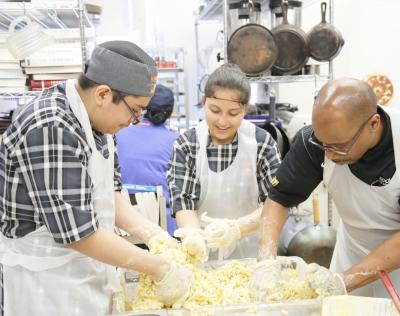 Students from Lakewood High School New Jersey prepare recipes to compete in the Sodexo sponsored 2018 Kitchen Wars Challenge.