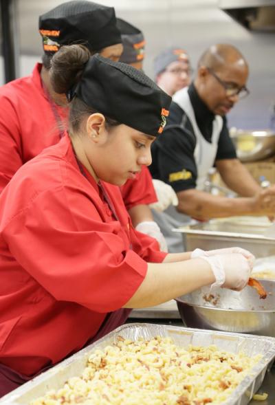 Students from Lakewood High School New Jersey prepare recipes to compete in the Sodexo sponsored 2018 Kitchen Wars Challenge.