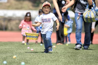 Children race to collect Easter eggs during the 12th Annual Easter Egg Hunt at StubHub Center hosted by the LA Galaxy Foundation and StubHub Center Foundation on March 30, 2018.
