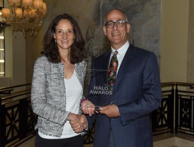 Atlanta McIlwraith of Timberland accepts the 2018 gold Halo Award from David Hessekeil, Engage for Good president, at the Engage for Good conference in Chicago. The award recognized Timberland’s and the Smallholder Farmers Alliance’s partnership, “Planting Seeds for Haiti’s Future,” as the Best Environmental Campaign of the year.