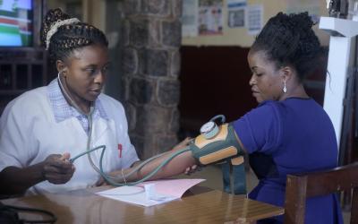Cordel Ndasi, a nurse at the Etoug-Ebe Baptist Hospital, measures a patient’s blood pressure. She hopes patients will be more motivated to know their status and avoid complications if they can have access to affordable medicines. “As a nurse, it pains my heart when I see someone coming in with complications. If this person had been diagnosed earlier, we could have given her a treatment to keep her healthy and productive.”