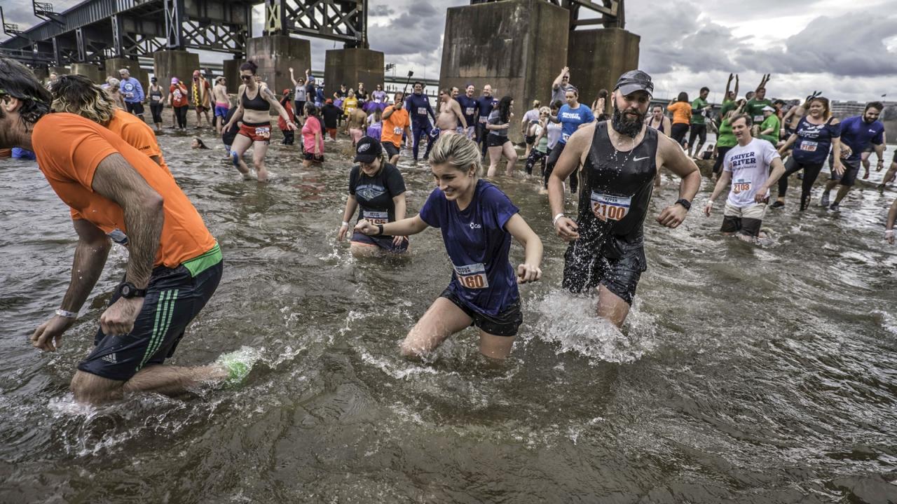 Volunteers take the plunge at Keep Virginia Beautiful's 4th annual "Shiver in the River." (Photo by Dave Parrish)