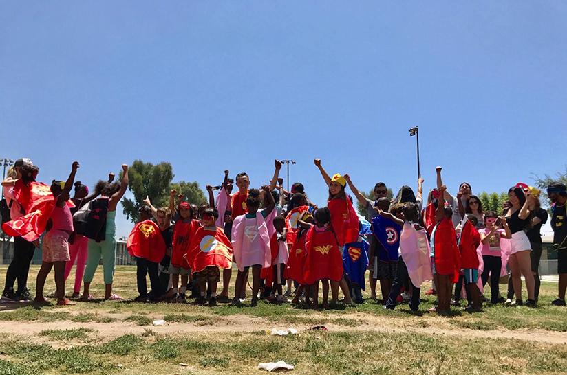 The children who attend Red Eye’s Saturday mentoring sessions pose for a group picture. Photo courtesy of Flora Huang.