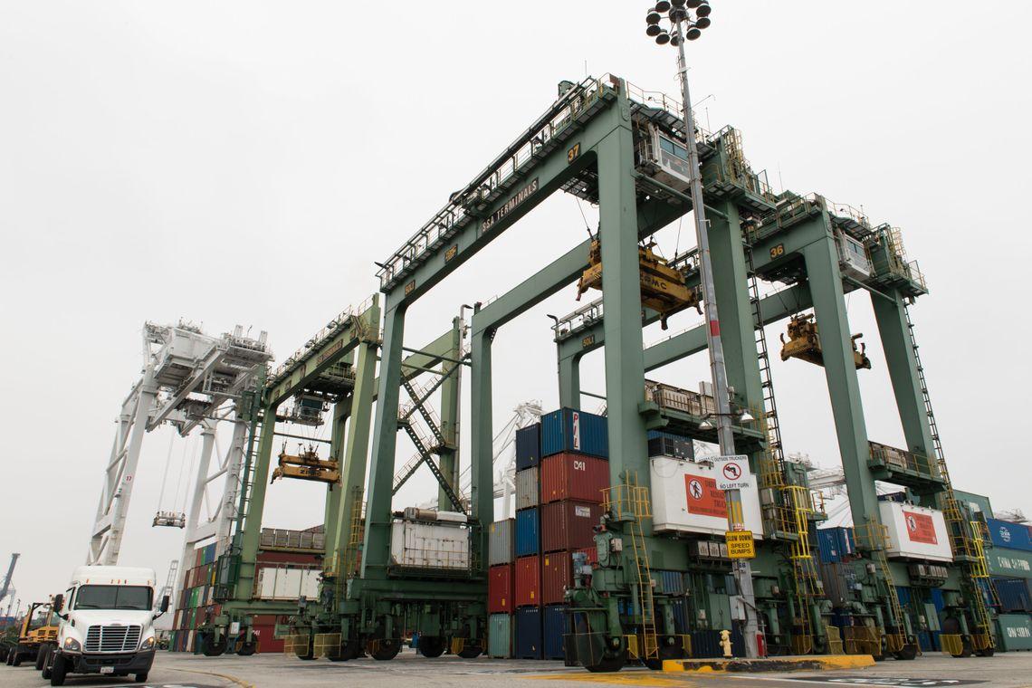 SCE will help convert nine of these green rubber tire gantry cranes to electricity at the Port of Long Beach. Credit: Elisa Ferrari