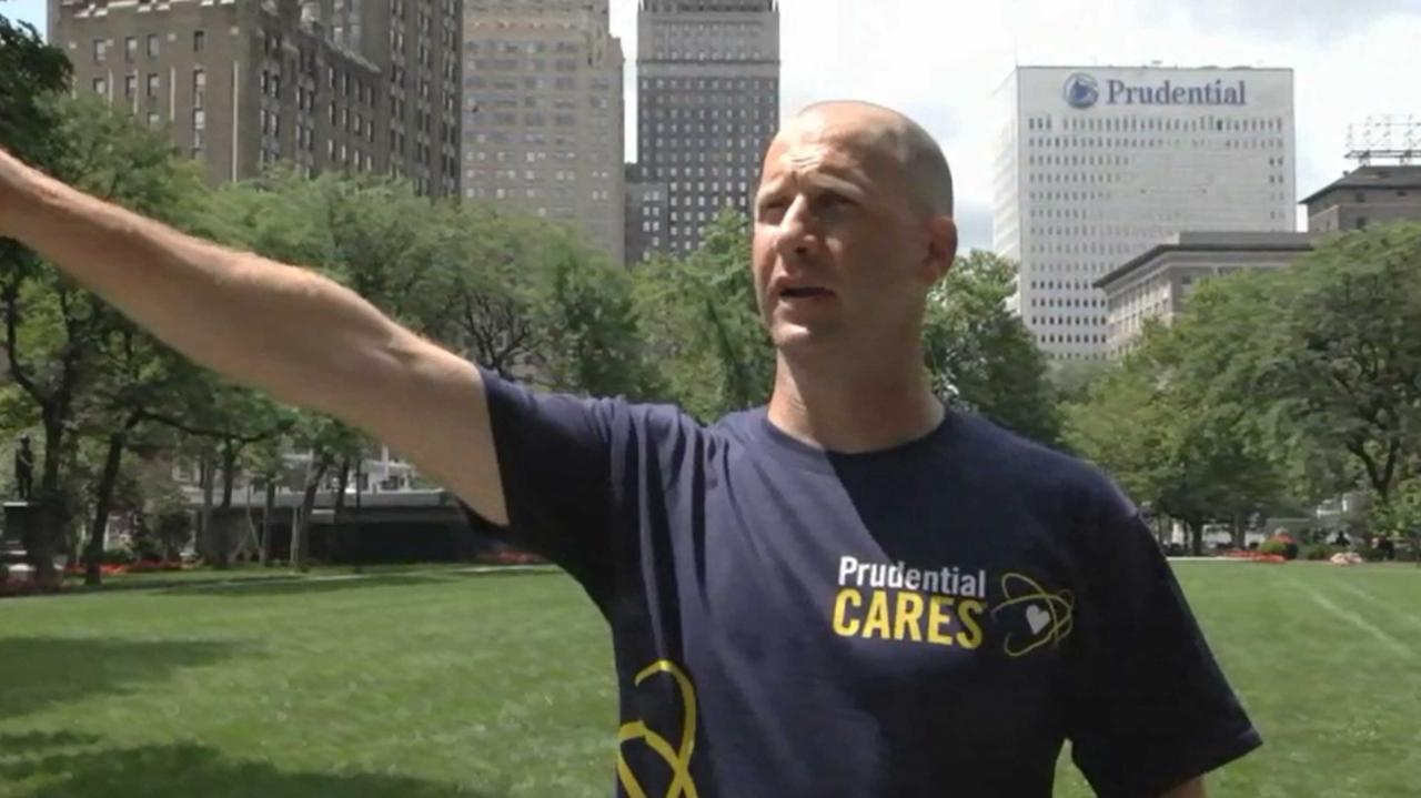 Prudential’s Reuben Teague, Director, Impact Investments, guiding a tour of Newark’s downtown. He is standing in Military Park, a core facet of Newark’s landscape, of which Prudential was a lead investor on the renovation.